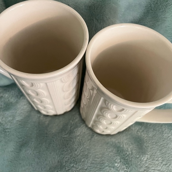 Coffee for two, they are 5"'s tall and look like a warm sweater to me, off white - Picture 2 of 3